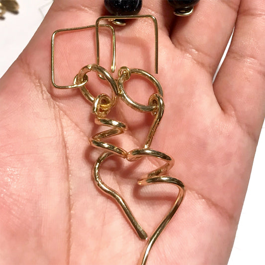 "Aretes Vuela Vuela”